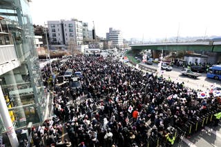 Pro-Yoon Suk Yeol supporters gather near the official residence of impeached South Korean President Yoon Suk Yeol on January 03, 2025 in Seoul